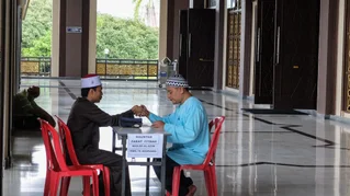 two people sitting at a table